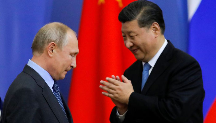 روس اور چین کے صدور ملاقات کرتے ہوئے / رائٹرز فوٹو