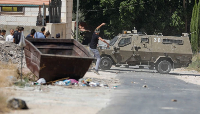 گزشتہ صبح درجنوں اسرائیلی فوج کی گاڑیاں جنین کے کیمپ میں داخل ہوئی اور فائرنگ کی/فوٹو بشکریہ رائٹرز