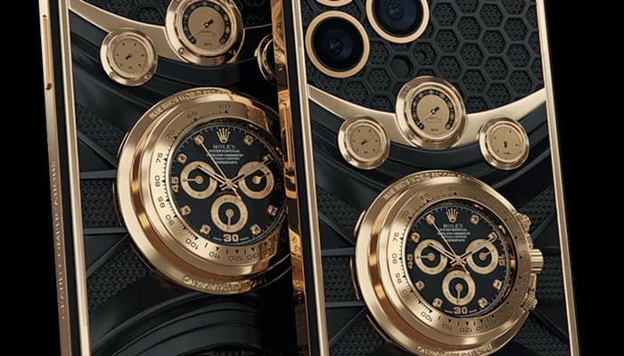 The phone features a gold watch / Photo courtesy of Caviar
