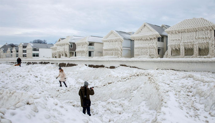 After a 'crystal' layer of snow froze on the houses along Crystal Beach, people even called the name of the lake a happy coincidence — AFP