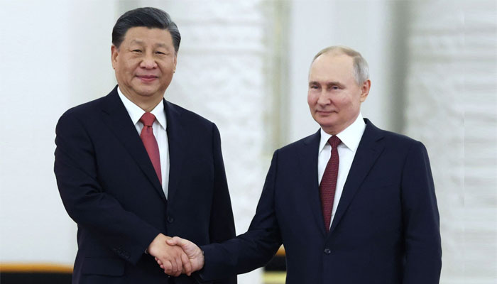 چینی صدر سے بلا تکلف اور بامعنیٰ گفتگو ہوئی: پیوٹن — فوٹو: اے ایف پی