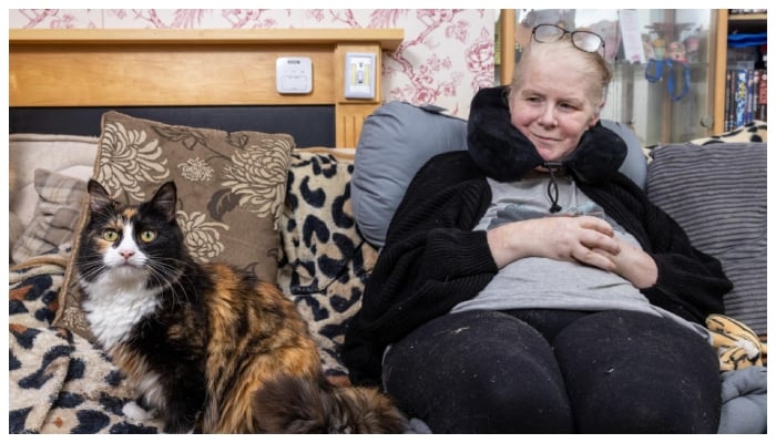 Amanda, 51, was saved from falling into a coma by her pet cat when she was about to collapse from a late-night sugar crash__Photo: Foreign Agency
