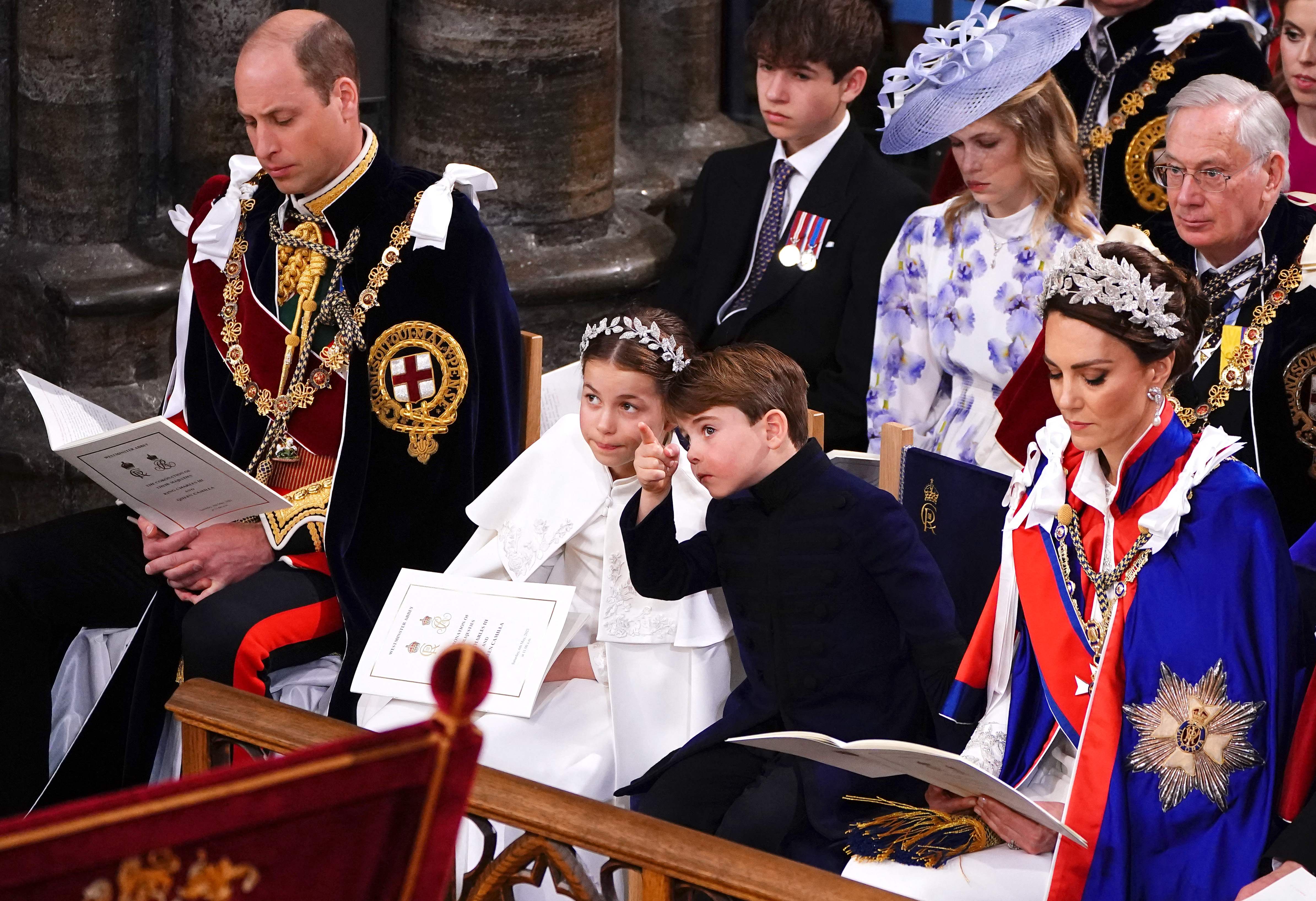 The coronation ceremony lasted several hours, during which Prince William's children were talking about something