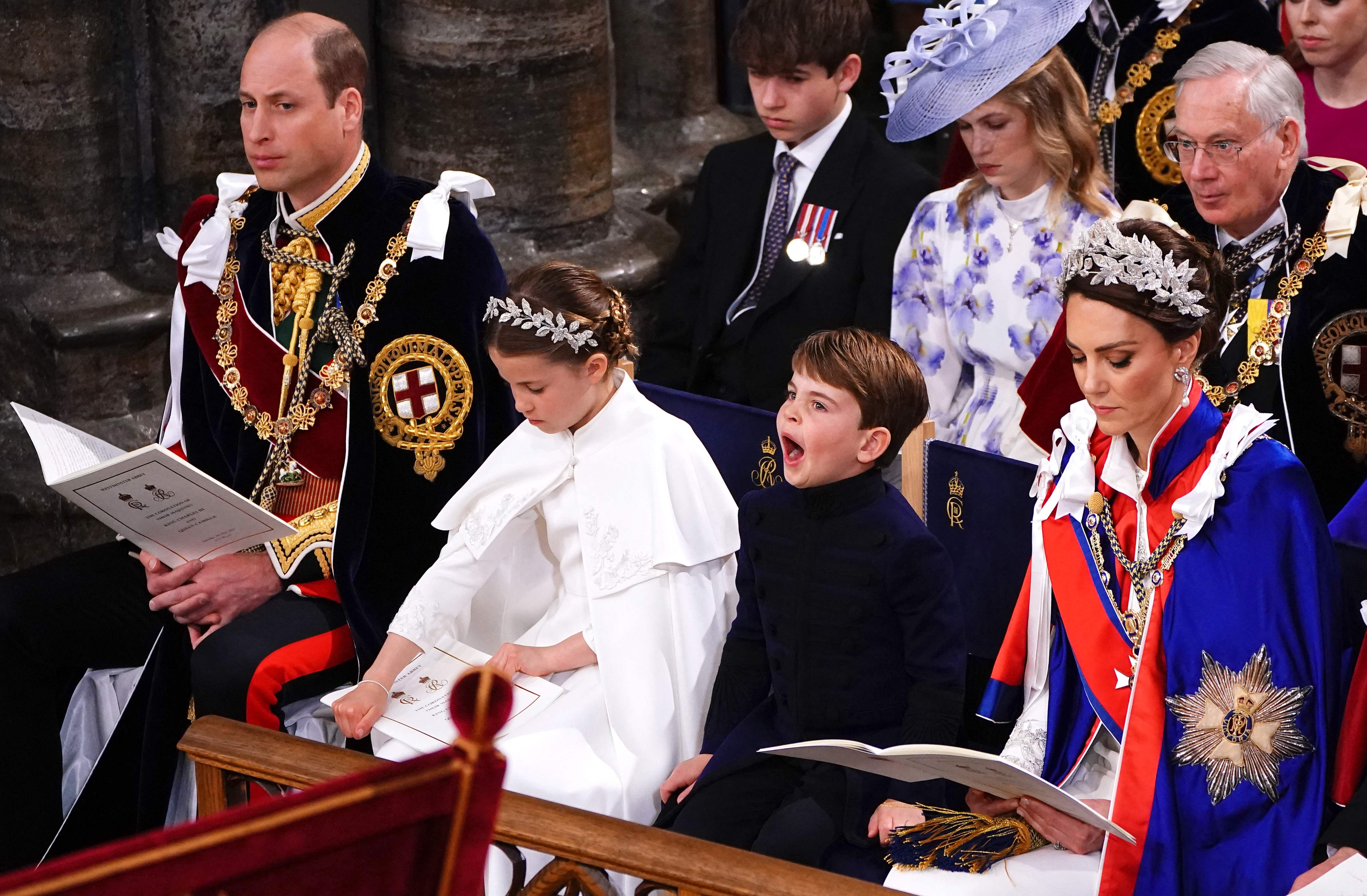 Prince Louis, grandson of King Charles, yawns during the coronation ceremony