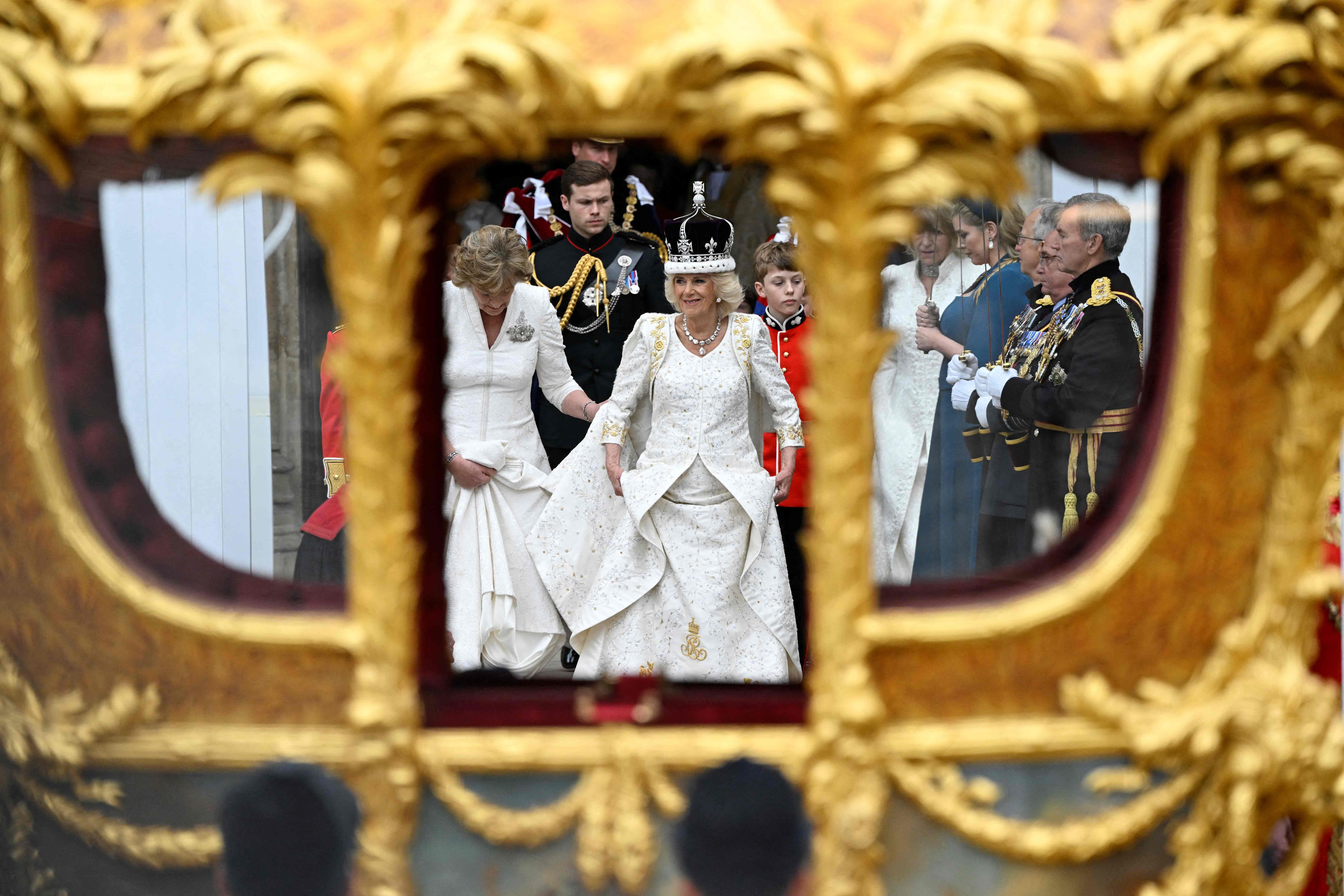 After the coronation, Queen Camilla and King Charles left Westminster Abbey in a royal carriage and inspected the parade.