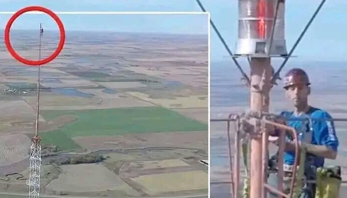 اس شخص ہر 6 ماہ بعد اتنی بلندی پر بلب تبدیل کرنا ہوتا ہے / فوٹو بشکریہ Prairie aerial